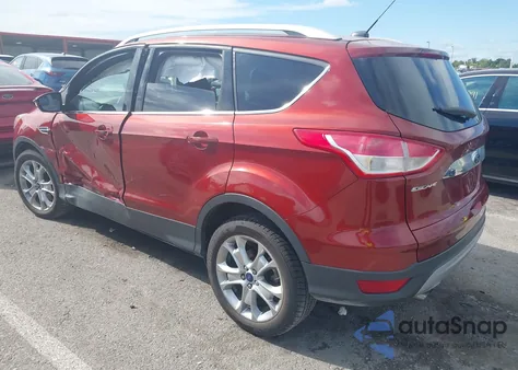 2015 Ford Escape Titanium z USA, uszkodzony, nr VIN 1FMCU0J97FUA83504